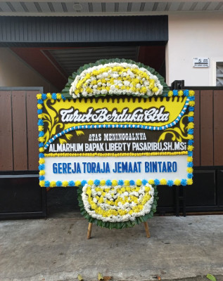 Papan Bunga Duka di Harapanjaya